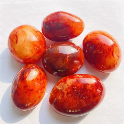 China DONGHAI Wholesale Hot Sale Natural Crystal Red Carnelian Agate Palm Stone for Chakra Healing for sale