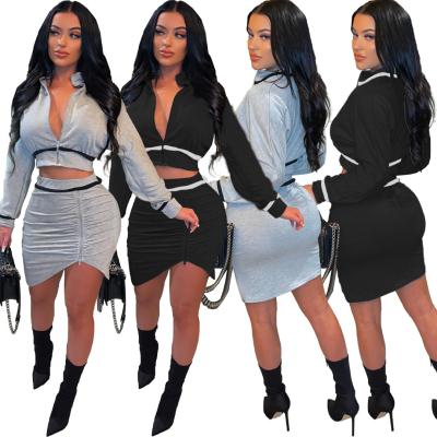 China 2022 QUICK DRY new spring patchwork pleated two-piece set stacked top Mini Skirt Set Women Clothing zipper crop skirt suit skirt 2 piece set for sale