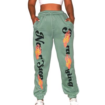 China Women's Breathable Pants Flames Print Bouquet Foot Pants New Letter Printing Loose Guard Pants Plus Size Trousers for sale