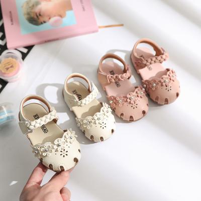 China Baby Flower Sandals Soft Sole Baby Hollow Flower Princess Sandals with Pearls for Baby Girl for sale