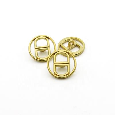 China Viable custom design zinc hollow slloy metal sewing accessory garment leg coat gold button for sale