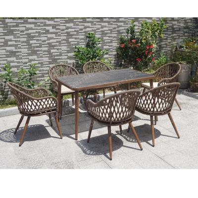 China Modern luxury woven outdoor rope furniture with rope chairs outdoor patio furniture and teak wood table for sale