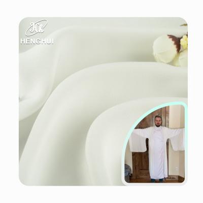 China Wrinkle Resistant Sea-Island 105GSM Fiber Silk-like Textiles For Materials Robe Breathable 100% Arabian White Microfiber Satin Polyester Fabric for sale