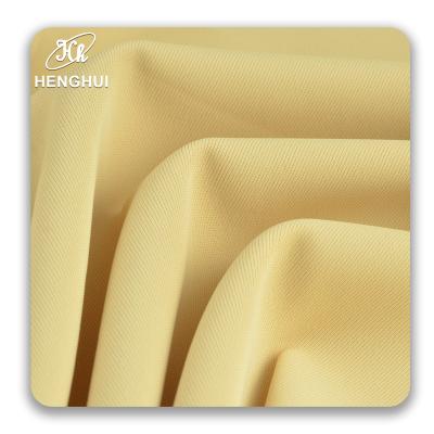 China Fashion wrinkle resistant lightweight 245G polyester filament elastic fabrics spring and small summer suit pants dress fabric for sale