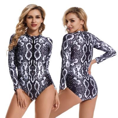 China Women One Piece UPF50 Long Sleeve Surfing Custom Muttahida Majlis-e-Amal Swimsuit UPF 50 Snake Pattern Hollow Zipper Swimsuit Rash Guard for sale