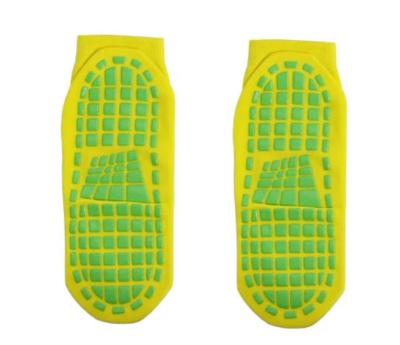 China Yellow Kids Non Slip Grip Socks Trampoline Children's Slide Gripper Socks For Teenagers for sale