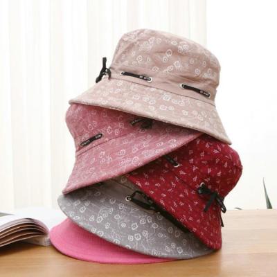 China Fashion \ New Comfortable \ Goods Customized Designer Fashion Fragmented Flower Printing Fisherman Hat Summer Bucket Hat Wholesale for sale