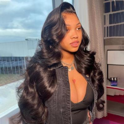 China Body Wave 180% Density Body Wave Wig Hd Transparent Lace Front Wigs Brazilian Virgin Human Hair 13*4 Lace Frontal Wig for sale