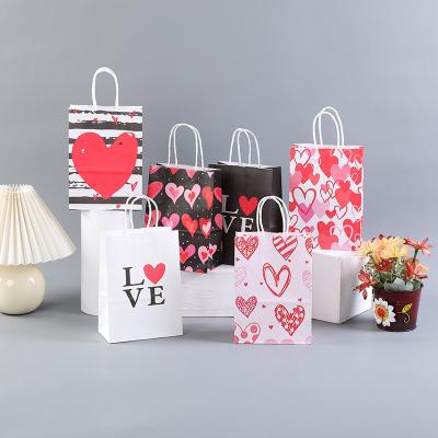 China Recyclable Party Paper Bag Love Couples Design Fashion Party Gift Paper Bags Candy Paper Bags With Handle For Valentine's Day for sale