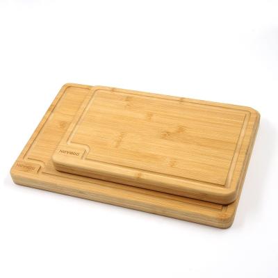 China 2021 Sustainable Natural Organic Bamboo Kitchen Gift Full Greenhouse Wood Cutting Board With Juice Bowl for sale