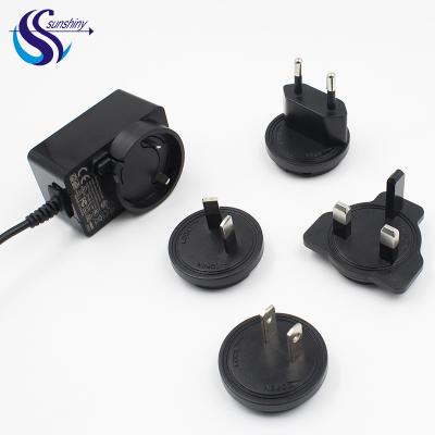 China UniversalÂ   Interchangeable Power Supply 36w 12v 3a Power Adapter Plug Adapter With UK US Kr Au Eu Plug for sale