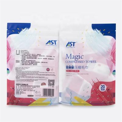 China Compressed Individually Wrapped Compressed Disposable Towels Quick Dry Compressed Towel With Candy Pack for sale