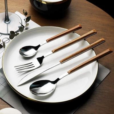 China Hot Selling Viable Flatware 16pcs Stainless Steel Cultlery Sets With Handle Cutlery Tableware Home Kitchen Simulated Wood Restaurant for sale