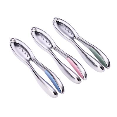 China Kitchen Tool Kitchen Tool Instrument Nordic Viable Color Multi Purpose Crab Clip Walnut Nut Nuts Nuts for sale