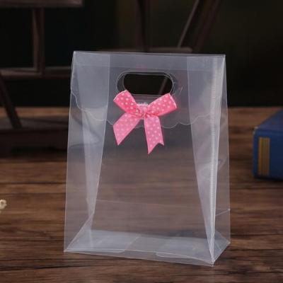 China Recyclable Clear Transparent PVC Birthday Gift Bag For Party Gift Plastic Bow Tie Bags Fashion PP Bags for sale