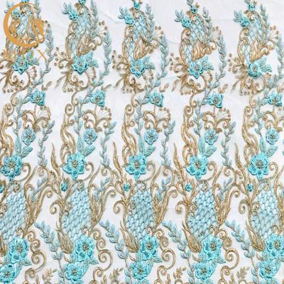 China el vestido nupcial de la tela del cordón del Applique del 140Cm diseña el bordado goteado para la boda en venta