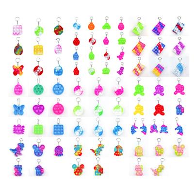 China Gift Yiwu Silicone Wholesale Decompression Key Chain Yellow Foreign Impatient Toys for sale