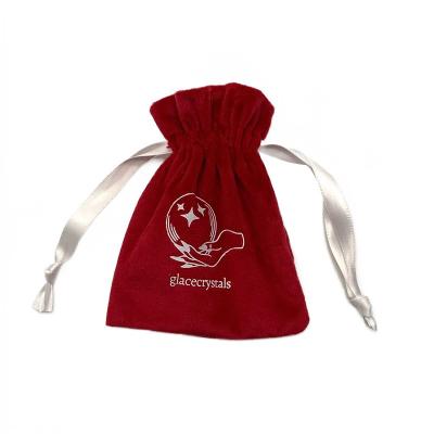 China Reusable Wholesale String Ribbon Jewelry Pouch Red Velvet Bag With Logo Heat Transferred for sale