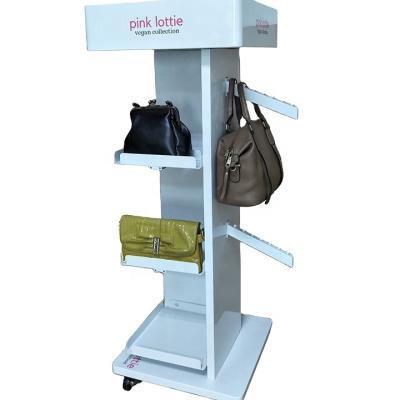 China Beautiful Display Racks For Handbags On Both Side With Casters / Multilayer Metal Free Standing Rack Racks Custom Fashion Logo for sale