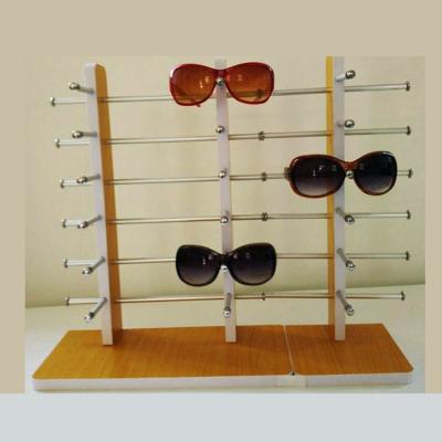 China Floor type high-grade sunglasses display counter showed frame exhibition stand woodiness glasses frames sunglasses display stand for sale