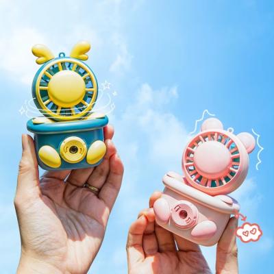 China Mini Dynamic Projection Toys Keychain Camera Fan Portable Toy Key Rings for sale