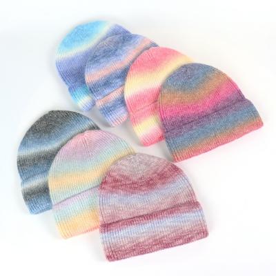 China COMMON hot sale tie-dye printed knitted hat men's new warm rainbow autumn and winter hat female gradient wool hat for sale