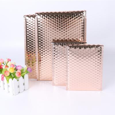 China Strong Adhesive Metallic Foil Rose Gold Poly Bubble Mailing Air Mail Mailing Bags Custom Padded Envelopes Gift Mailing Bags for sale