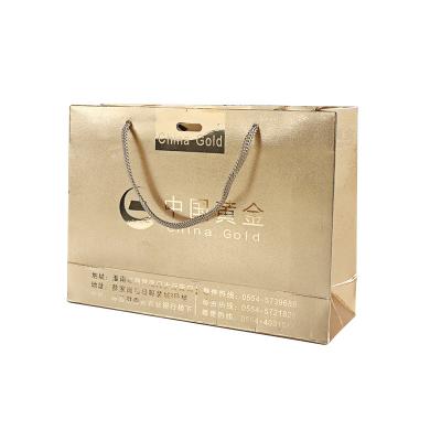 Κίνα Biodegradable Luxury Matte Gold Logo Printed Shopping Paper Bag With Rope Handles For Jewelry Packaging προς πώληση