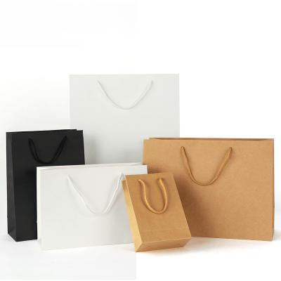 China Custom Logo Print Brand Brown Black Wholesale Biodegradable Cheap White Craft Kraft Paper Manufacturer Gift Shopping Packaging Paper Bag With Handle for sale