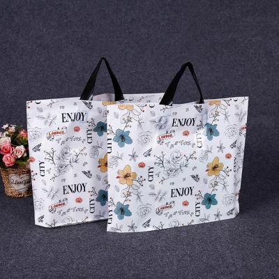 China China Supplier Moisture Proof Custom Design Logo Printing Plastic Promotional Bags Plastic Apparel Packaging Bags Shopping Bags With Handles for sale