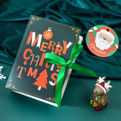 China Wholesale Recyclable Candy Box Merry Christmas Book Chocolate Candy Box Cartoons Magic Packing Box for sale