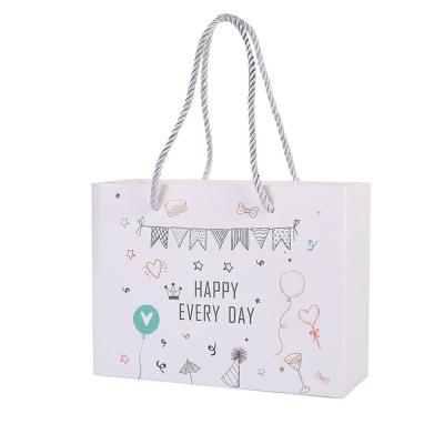 China Custom Reusable Retail Luxury Logo Printed Cardboard Paper Gift Bags Recyclable Manufacturing for sale