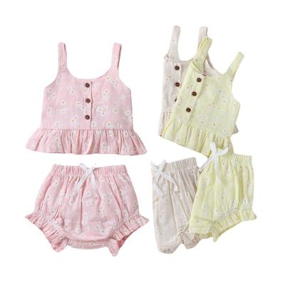 China Summer Breathable Sleeveless Infant Two Piece Set Button Floral Girl Tops Short Suit for sale