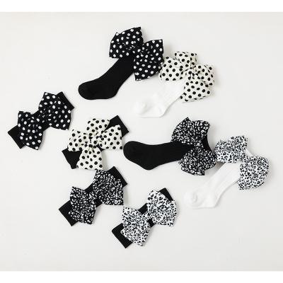 China Breathable Wave Dot Princess Black And White Baby Medium Tube Bangs Butterfly Hair Band Set for sale