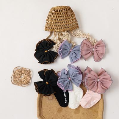 China New Breathable Baby Hair Band Cotton Seersucker Bow Sock Set for sale