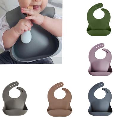 China Factory BPA Free Manufacturers BPA Free Bibs Beige Waterproof Empty Baby Silicon Baberos for sale