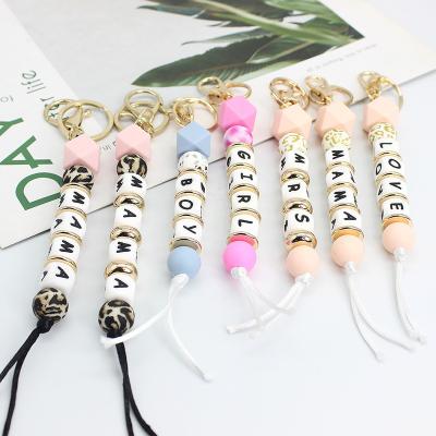 China Hot Selling Fashion Amazon Silicon Beads Leopard Design MOM Letters Beaded Key Ring Custom Keychain For Silicon Woman And Girls for sale