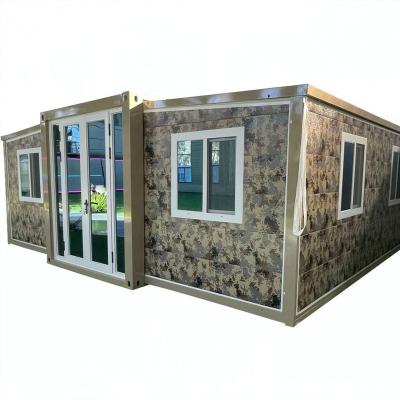 China Double wing foldable container house Three-in-one mobile expandable house for sale