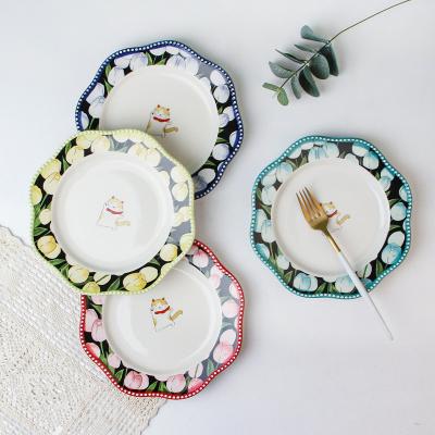 China Viable Unique Wave Shape Porcelain Ceramic Snack Dish White Dot Embossed Edge Flower Charger Dish for sale