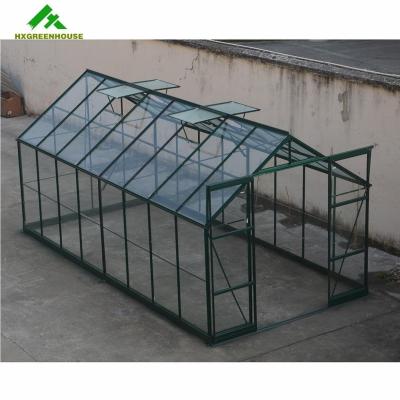 China Greenhouse Tempered Glass Easily Assembled Green House For Greenhouses Grown Door Winter Use Low Cost 4mm Dark Green Hardin Garden Kit for sale