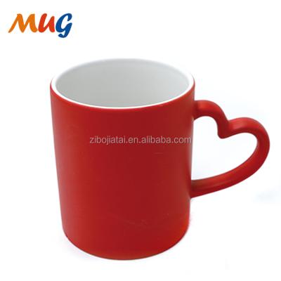 China Wholesale Viable Chinese Matte Promotion Factory Colorful Ceramic 11oz Coffee Mug With Heart Handle for sale