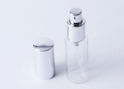 Cina bottiglia di profumo di plastica trasparente rotonda 40ml con la pompa di alluminio del profumo in vendita