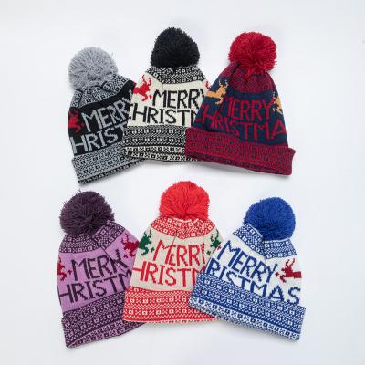 China COMMON Pom Pom Decoration Christmas Stocking Hat Plush Santa Warm Festival Winter Beanies Customized Colorful Adult Knitted Hat for sale