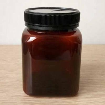 China 1000g canned food clear and amber plastic jar bottle with temperproof lid &1kg plastic honey jar with black cap for sale