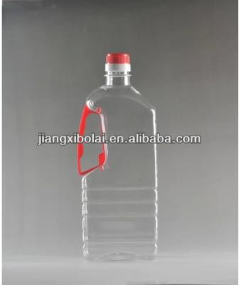 China Clear Frying Oil Pet Oil Bottle With Cap Food Grade, 1L Oil Bottle Pet Edible Oil Bottles With Handle for sale