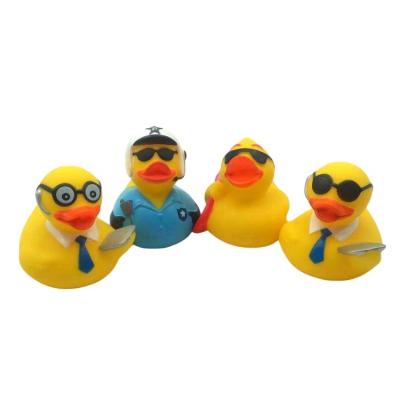 China Duck Floating Baby Shower Gift Racing Toy Jugetes Swimming Pool Rubber Bath Animal Bathroom Toy For Child for sale