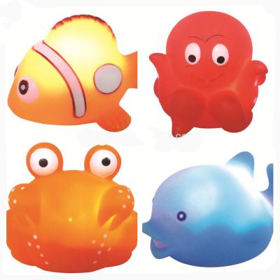 China Lovely Vinyl Rubber Animals PVC Flashing and Floating Duck Sea Animal Glow LED Night Light Bath Toys for Babies for sale