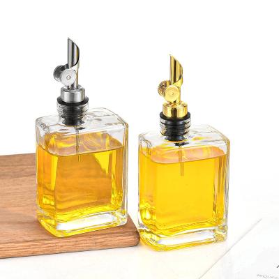 China Factory Logo Kitchen Stainless Steel Nozzle Custom Wholesale Olive Oil Glass Freshness Preservation Bottle for sale