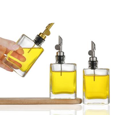 China Wholesale High Quality Freshness Preservation Oil Control Stainless Steel Spout Glass Bottle For Olive Oil for sale