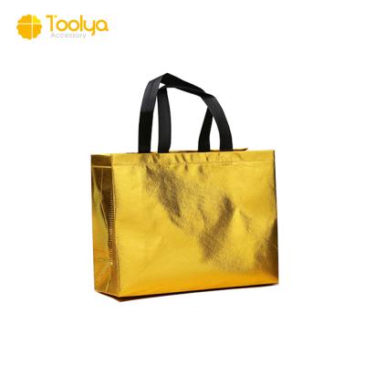 China Customized recyclable prmoation gold and silver colored laser laminated non woven pp non woven shopping tote bag for sale